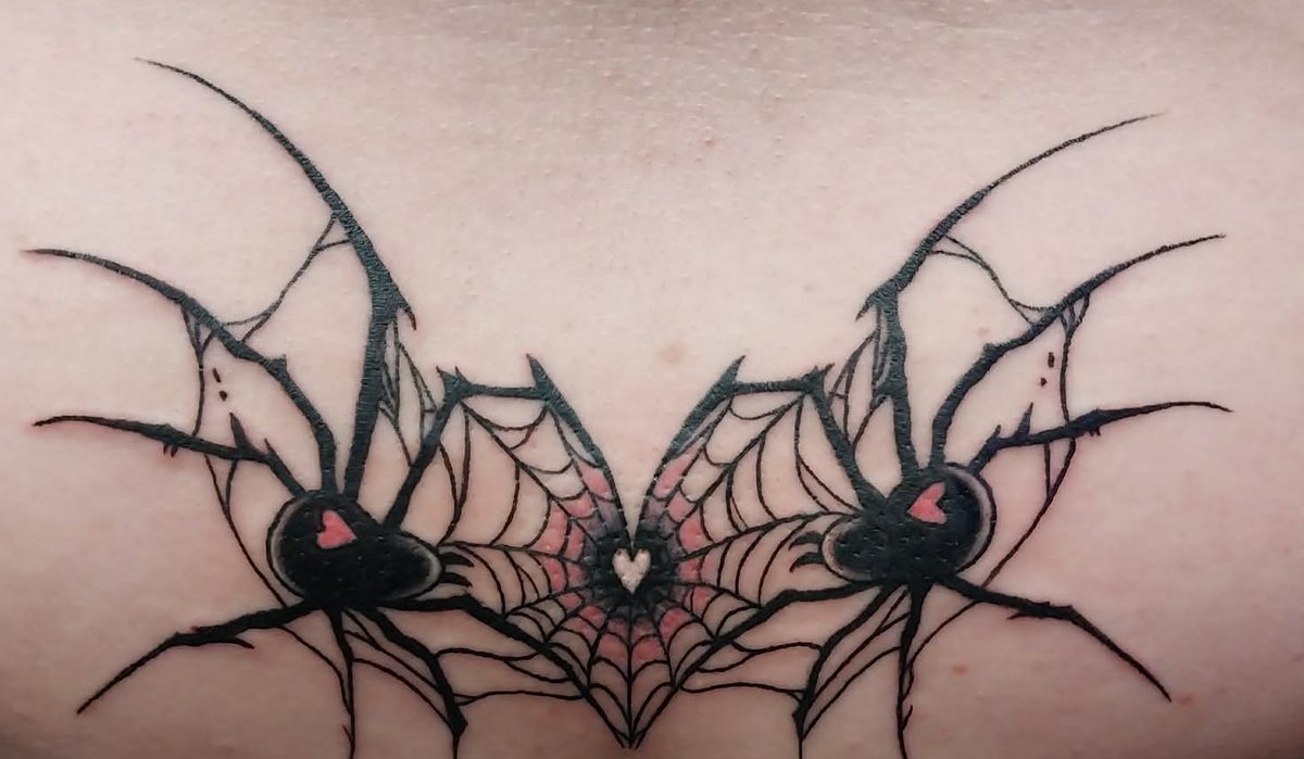 Two black widow spiders flanking a heart-shaped web with pink shading, across a sternum